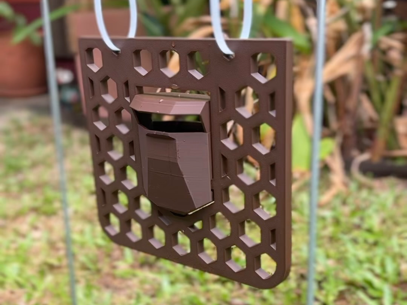 Wombat Mange Flap V1 hanging at a burrow entrance